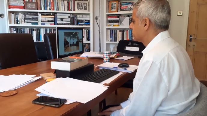 Mayor of London shown on video call from his office