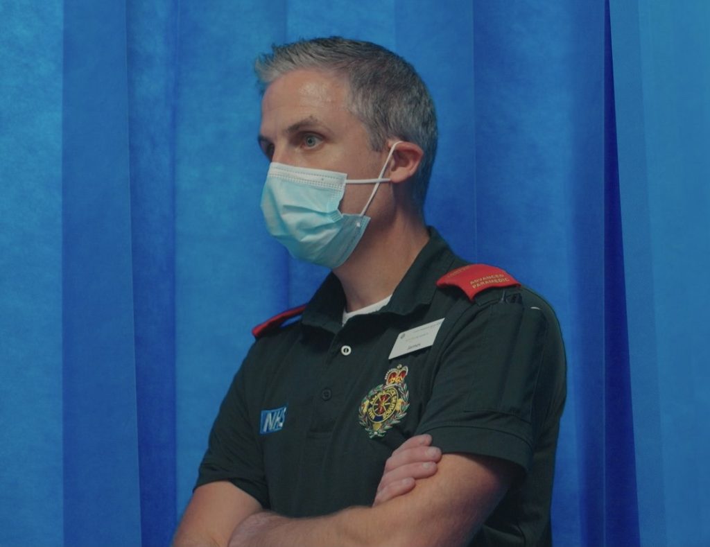 An Advanced Paramedic wearing a face mask.