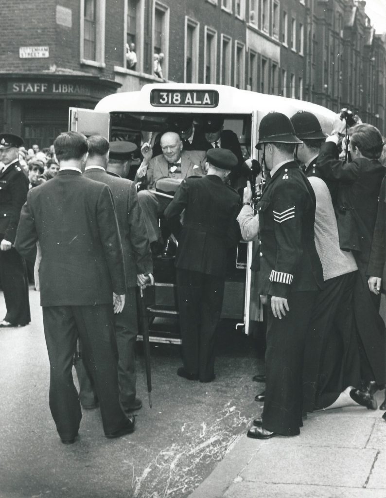 Winston Churchill getting out of a London ambulance