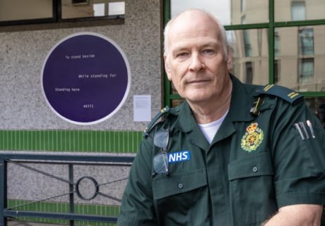 Paramedic posing for a picture outside Waterloo HQ