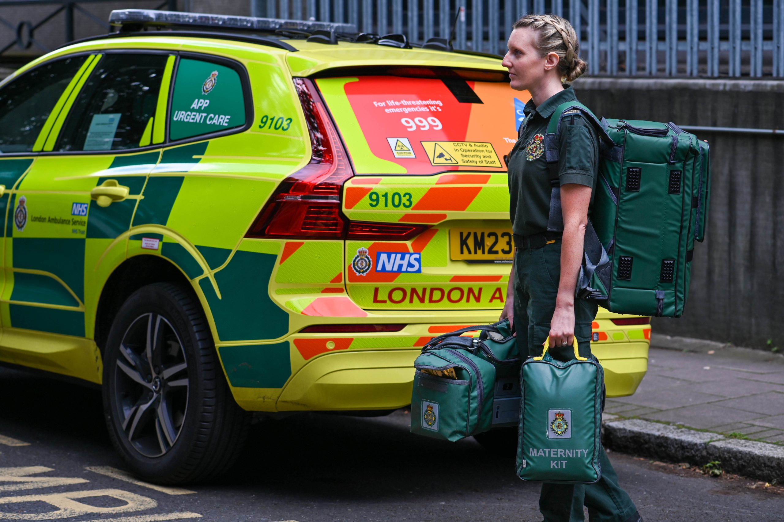 Advanced Paramedic carrying maternity kit and other equipment.