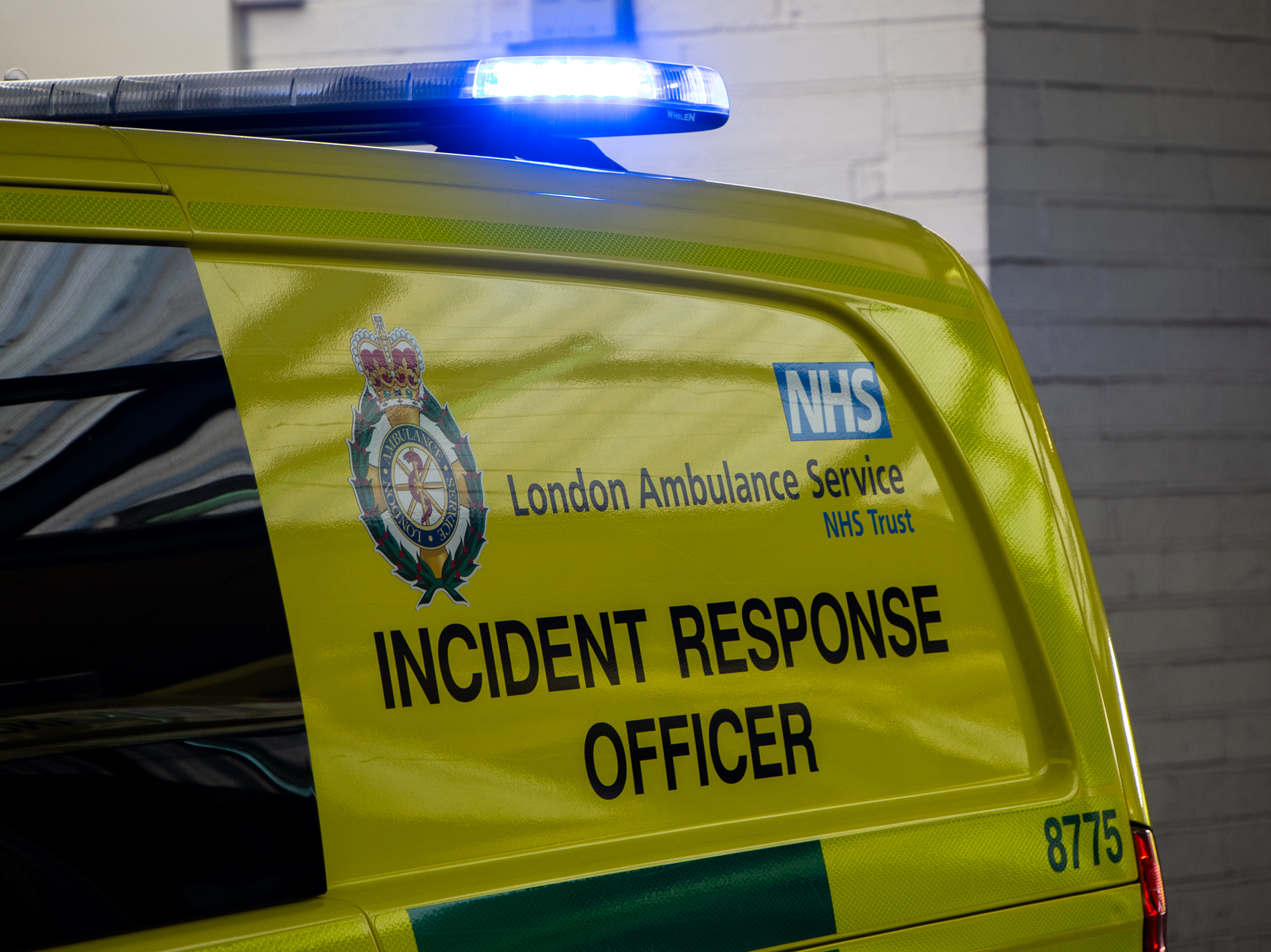 An Incident Response Officer vehicle on blue lights
