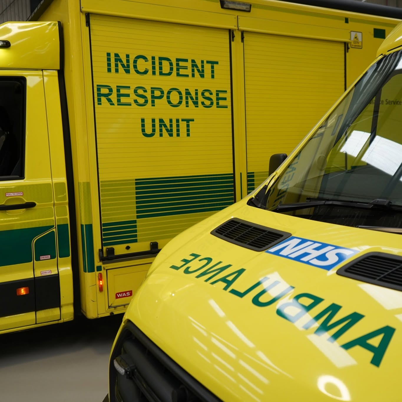 London Ambulance incident response unit fleet parked in a station.