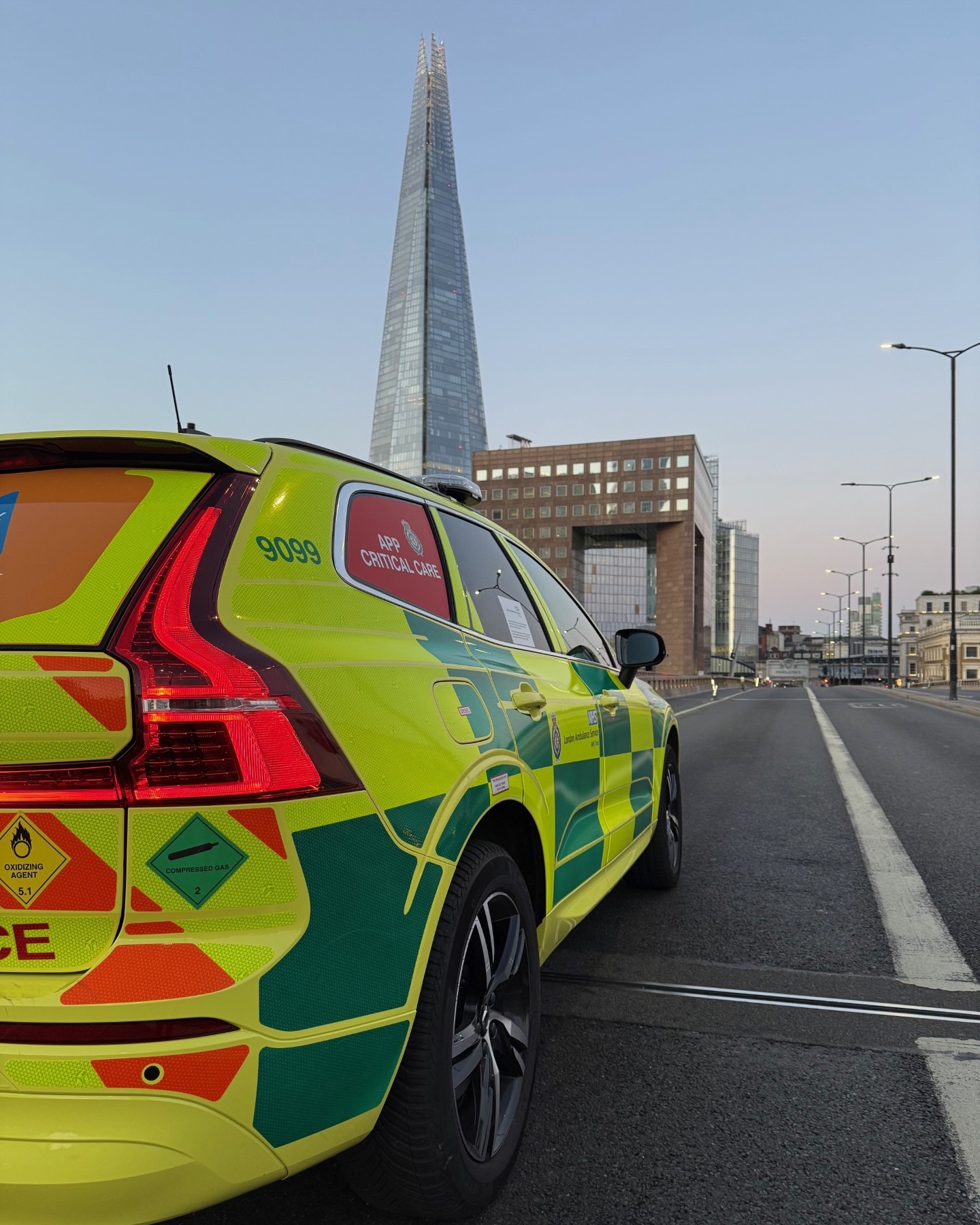 A fast-response car in front of the shard.