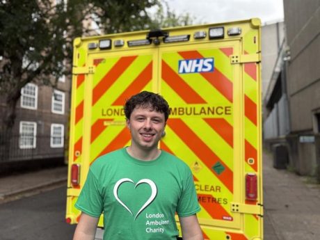Member of staff outside of an ambulance