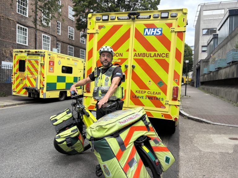 CRU member in front of the ambulance