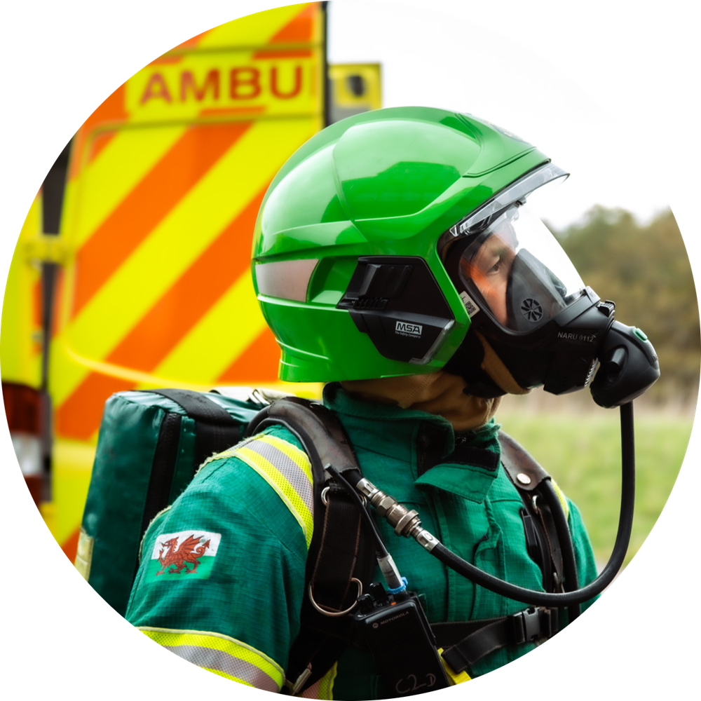 A specialist paramedic wearing breathing apparatus and PPE.