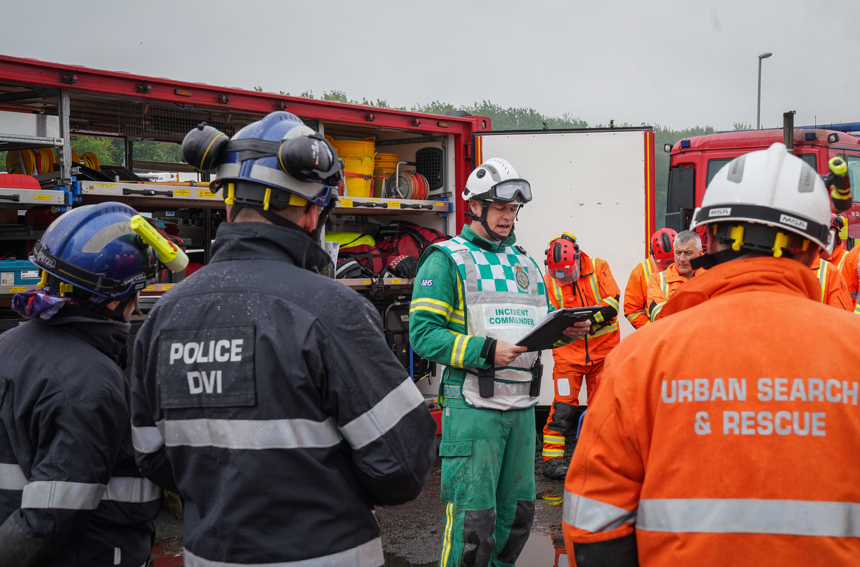 A mix of emergency services collaborating at a training exercise