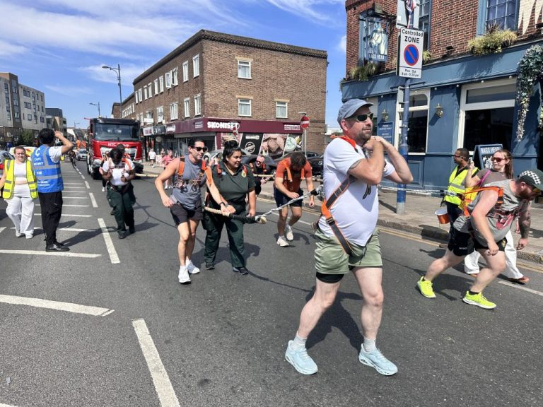 Featured image for London Ambulance teams pull 14-tonne truck in huge show of strength for charity