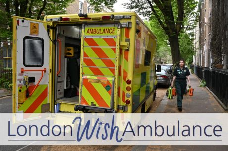 Member of London Ambulance End of Life team walking towards ambulance. Image has London Wish Ambulance Logo on it