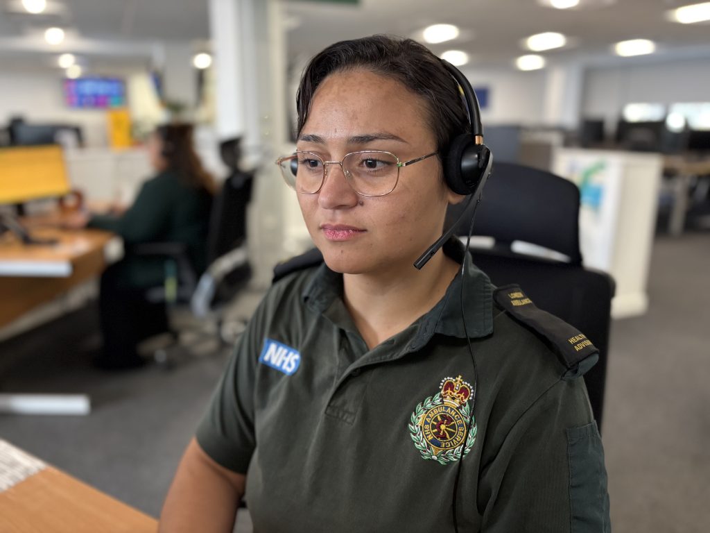 111 health advisor Maiara at her work station answering calls